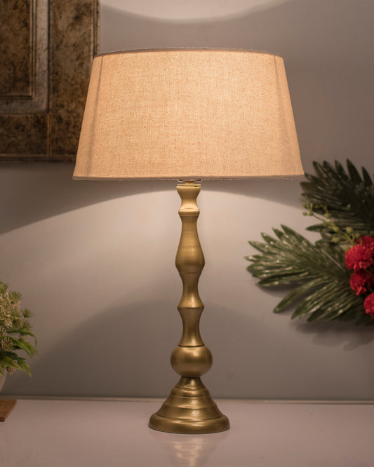 Teardrop gold brushed lamp with shade